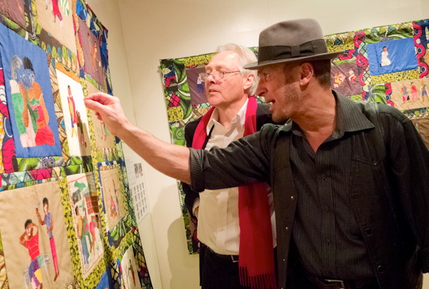 Close-up: Professor Joe Amarino praises the artistry of the Congolese quilts.