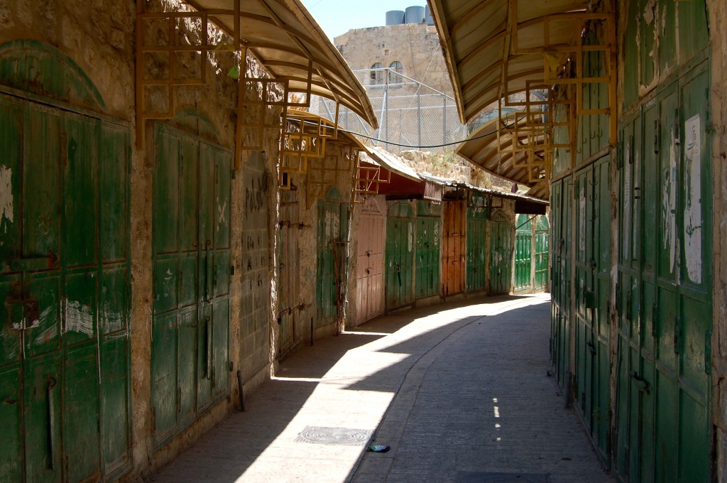 A view of Shuhada Street, virtually deserted. These shops were forcibly closed by Israeli soldiers. 