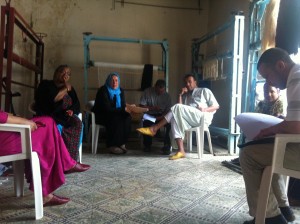 The electoral candidates meet with the women of the cooperative to try and gain their votes.