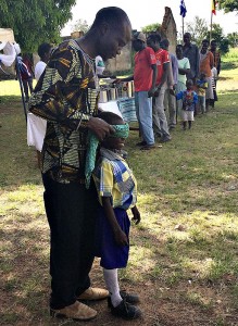 Deputy Head Teacher Oisiry Julius Brian Blindfolding a Student for a Game