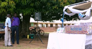 GDPU Chairmon Ojok Simon (Left) Announcing the Gifts for Tochi with GDPU Project Coordinator Ojok Simon (Right)