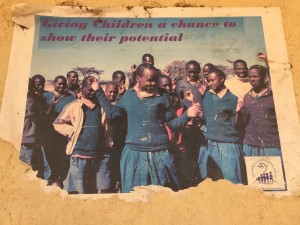 Flyer from a previous CPI Peace Camp pasted on the wall of a Samburu school 