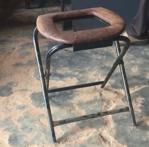 Foldable seat that students with disabilities can use instead of squatting.